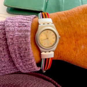 Women’s Swatch, multi coloured band